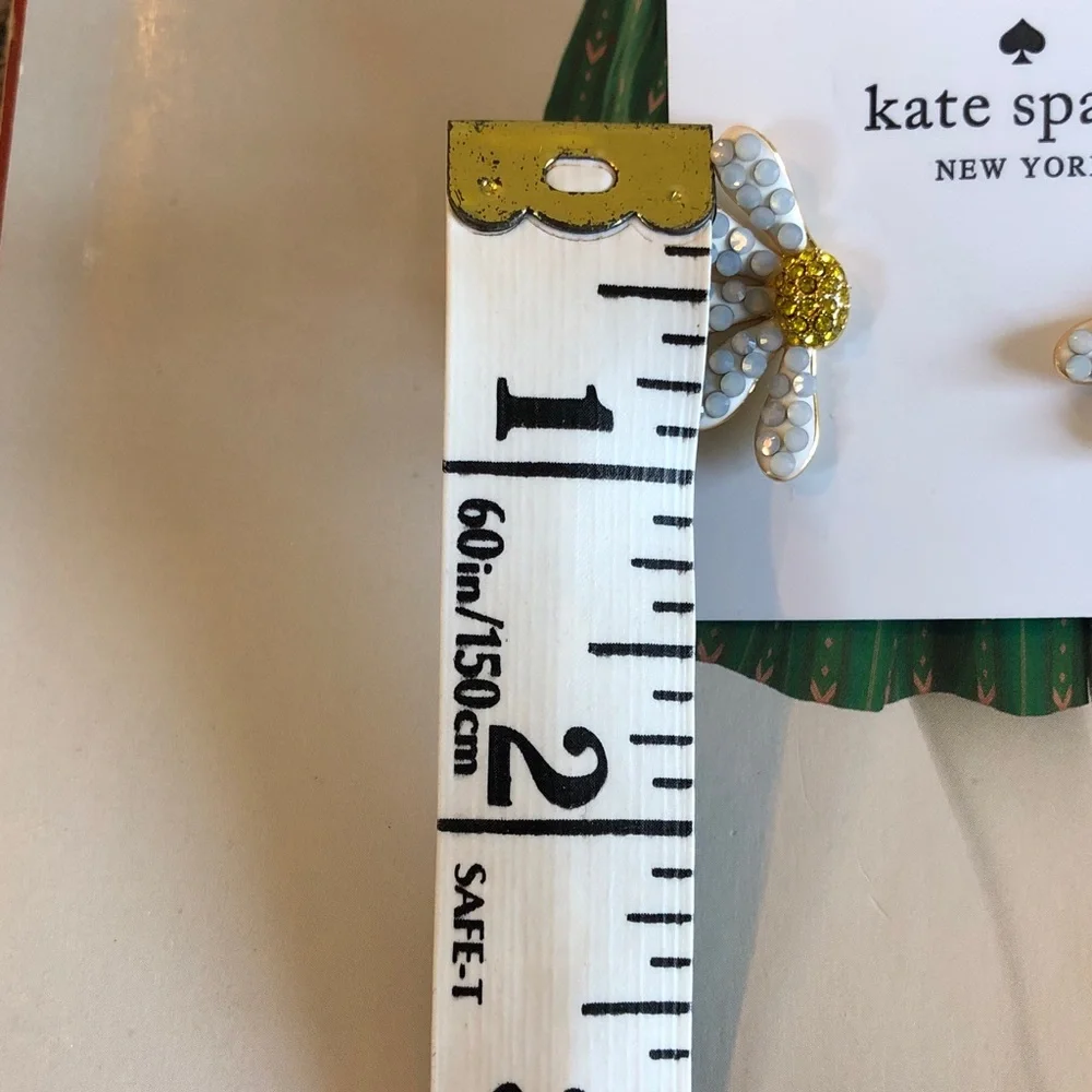 Authentic kate spade New on card White Petal & Gold Center Daisy Stud Earrings